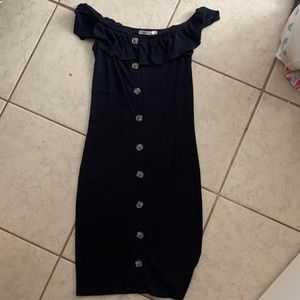 A medium black off the shoulder dress.